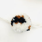 Luna -Leena Garland POM POM Leopard - L 2M - 100% zachte wol - handgemaakt in Nepal