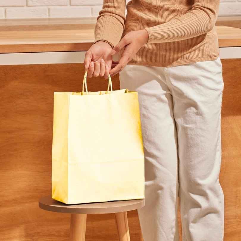 Papieren Tas (M) – Ivoor / Crème – 100 Stuks