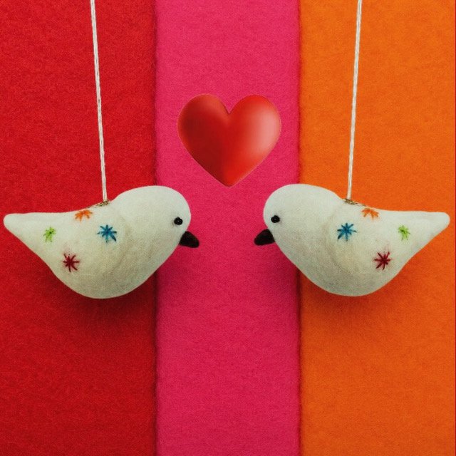 Luna-Leena vogel hangend ornament - veelkleurige sterren - wol - handgemaakt in Nepal