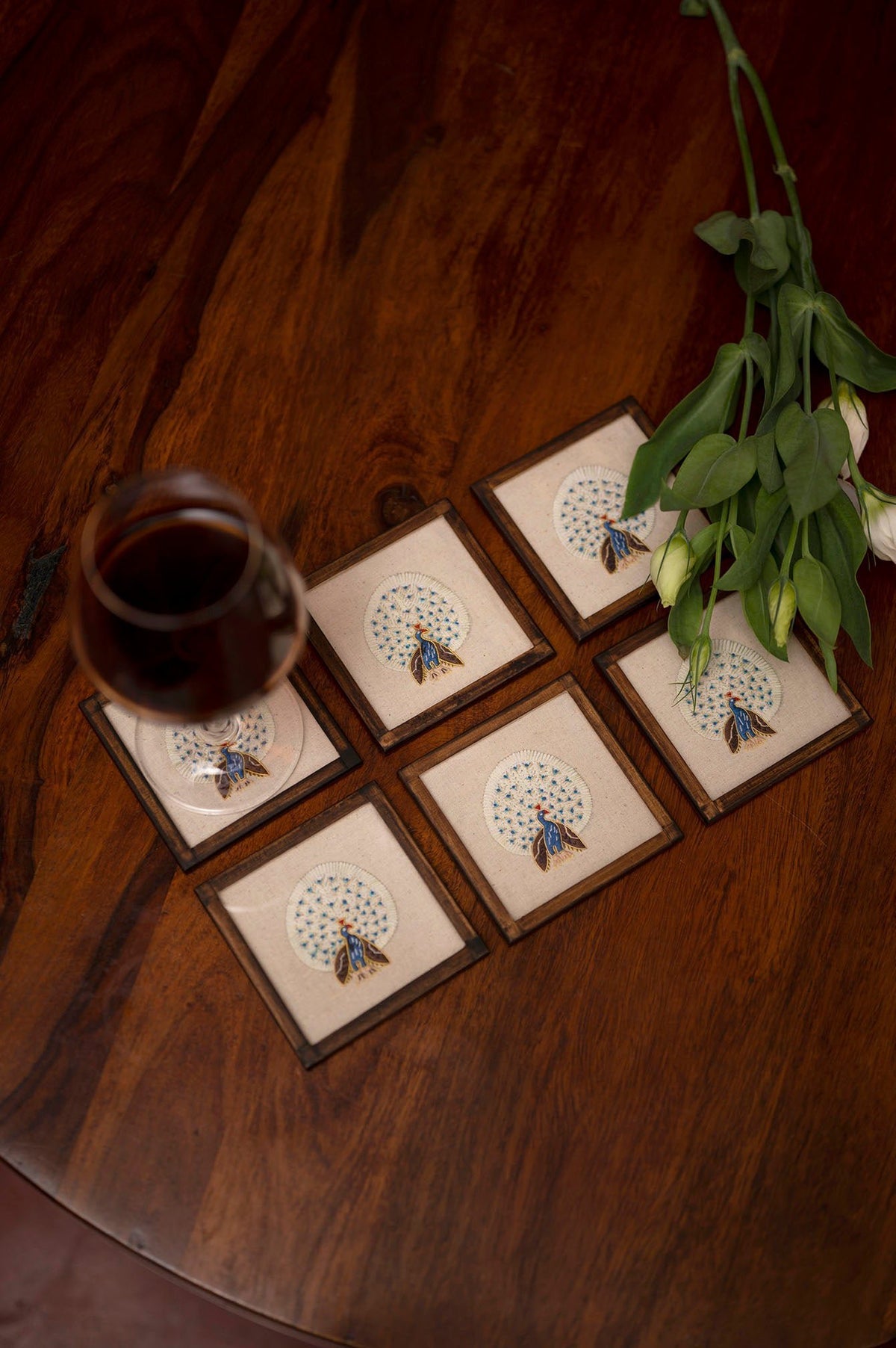 Handgeweven cocktailonderzetters met pauwmotieven - Set van 6