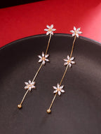 Oorbellen | Bloemenhanger verguld | Kristal