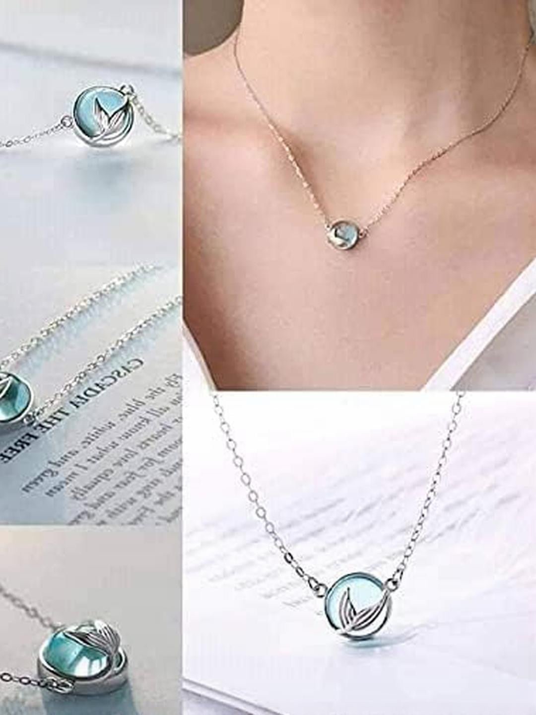 Zilverkleurige ketting – mode-sieraden – hanger van blauwe harsbladeren
