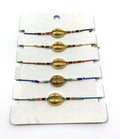 Armbandset cowry gold