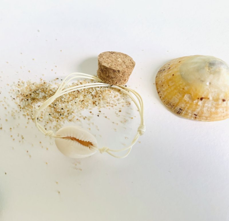 Flesje armband kauri