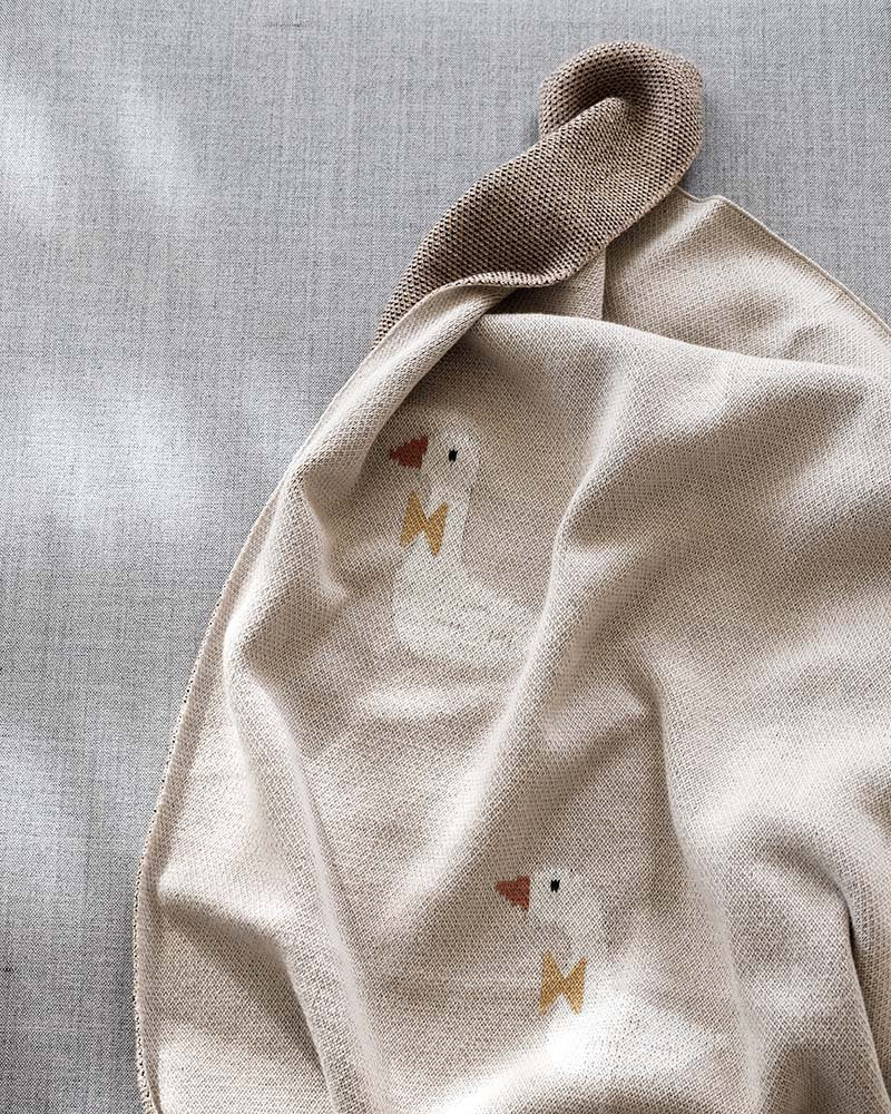 Gebreide katoenen babydeken, beige ganzen