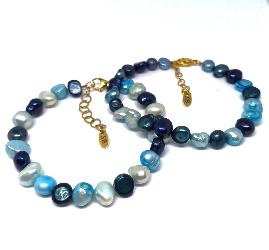 Galaxy parelarmband blauw tinten