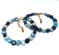 Galaxy parelarmband blauw tinten