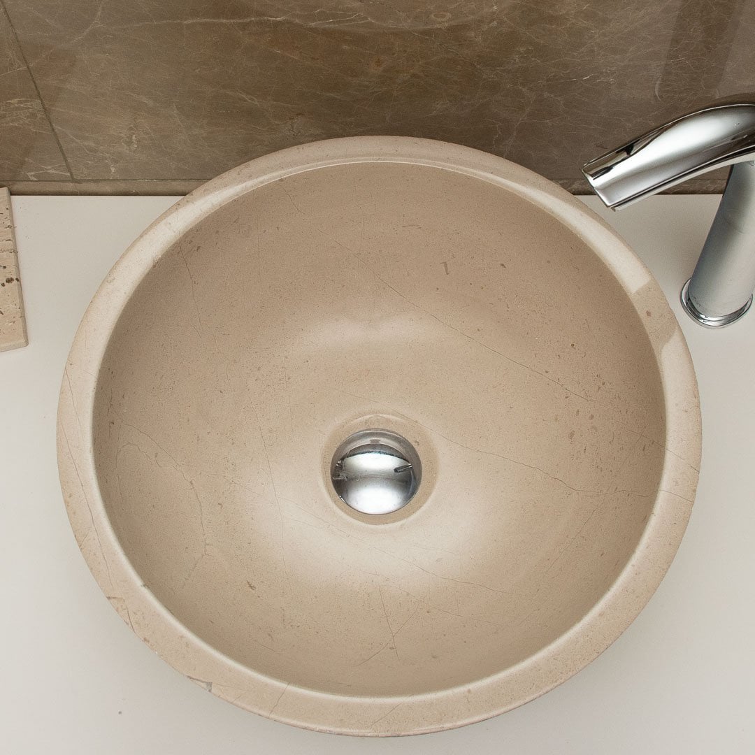 Beige marmeren wastafel