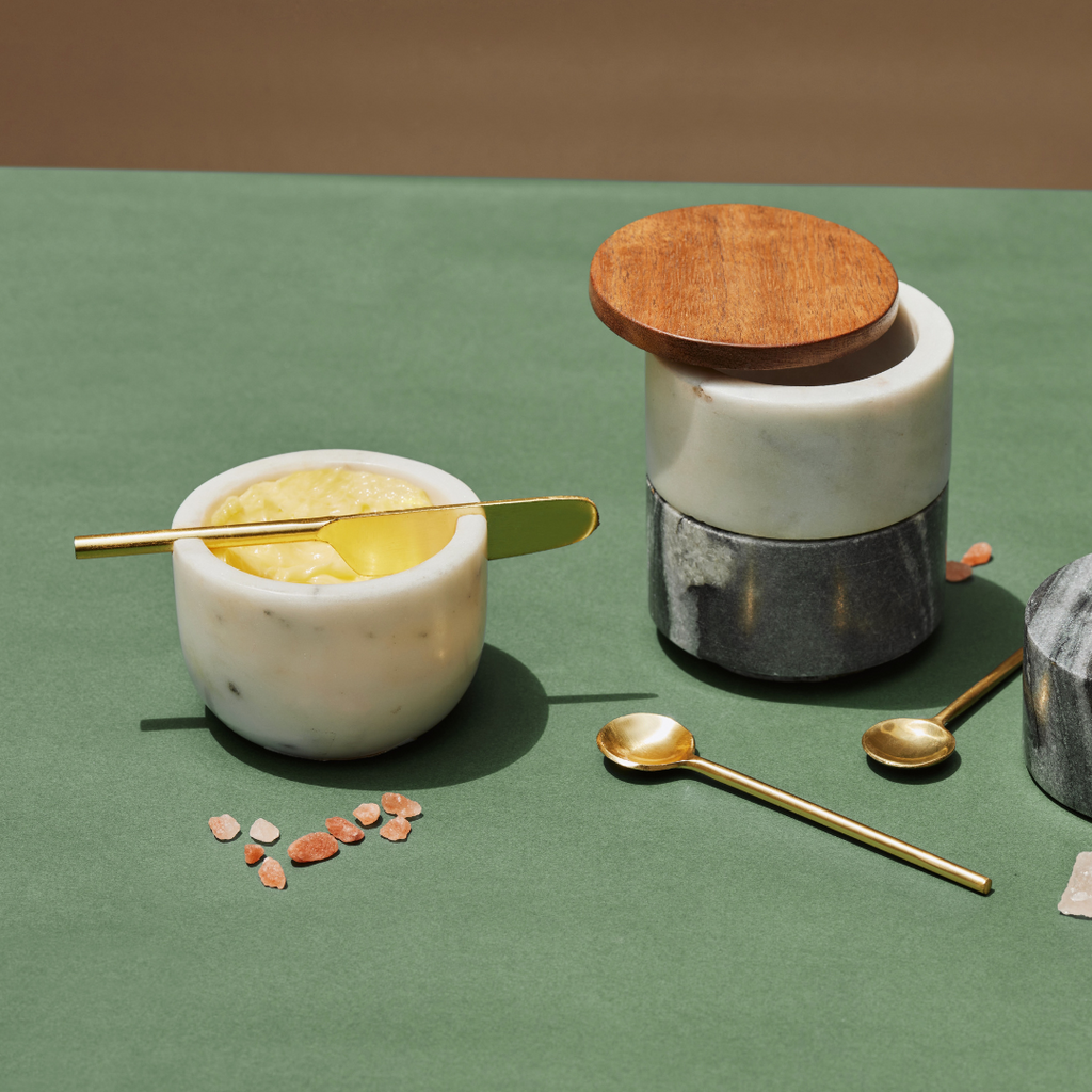 Marmeren botervloot met gouden mes