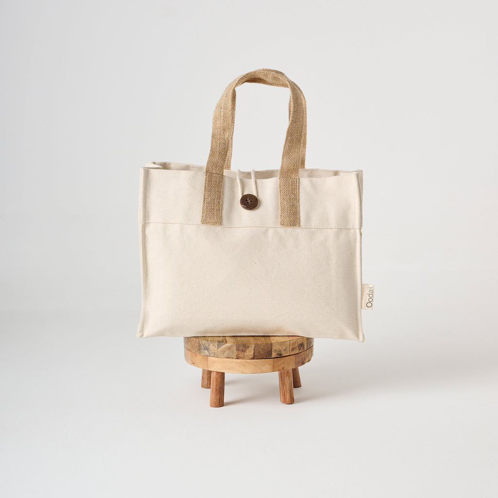Draagtas | Knoopsluiting van canvasjute