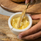 Marmeren botervloot met gouden mes