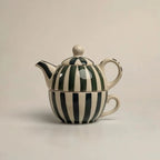 Steengoed blauwgroen en witte mokset - temperatuurbehoud
