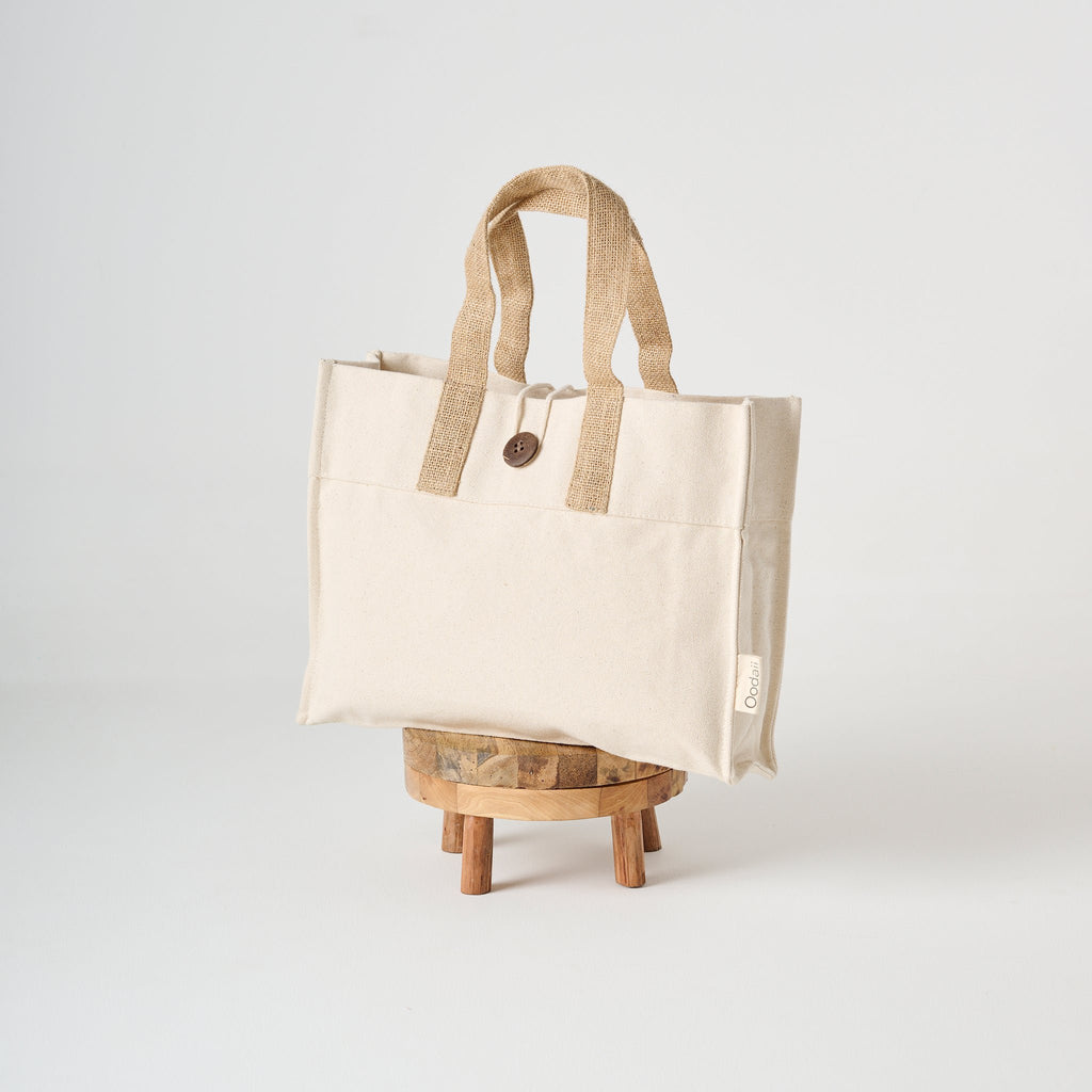 Draagtas | Knoopsluiting van canvasjute