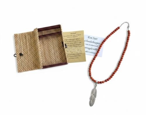 Damesketting met Koraal en veer