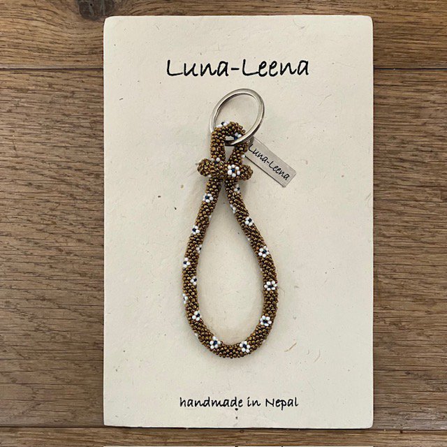 Luna-Leena kralenarmband / sleutelhanger rol 'bloemen' - gouden glaskralen - volwassen - hand gehaakt in Nepal