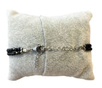 Damesarmband Onyx facet met Onyx connector kraal