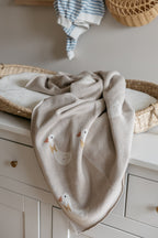 Gebreide katoenen babydeken, beige ganzen