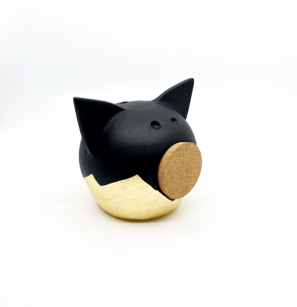 Verdeelde gouden piggy bank