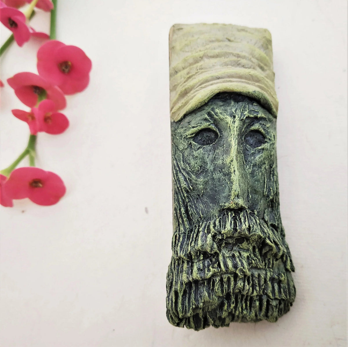 Handgemaakte maskerbroche