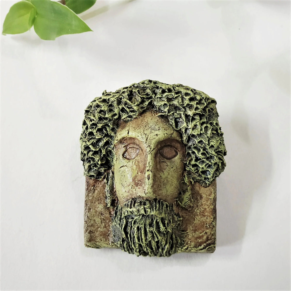 Handgemaakte maskerbroche