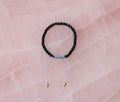 Dames armband Onyx 4 mm hartjes