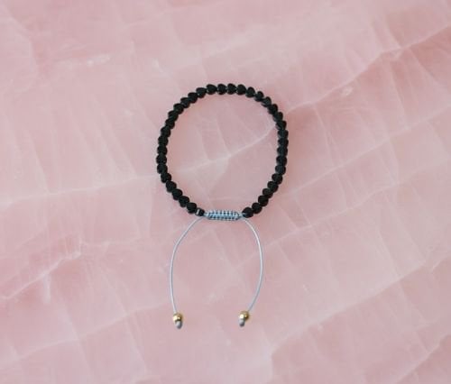 Dames armband Onyx 4 mm hartjes