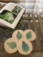 Onderzetters van papier-maché-Harsringar-blad
