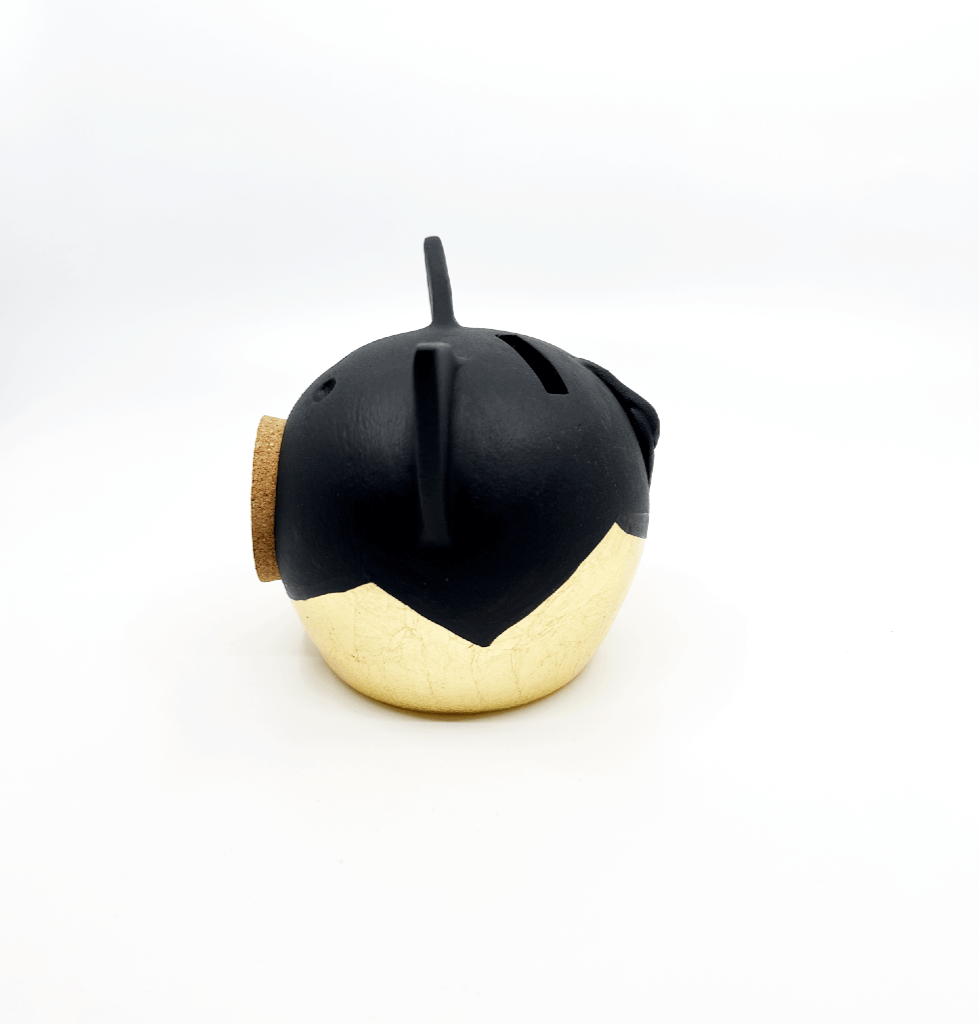 Verdeelde gouden piggy bank