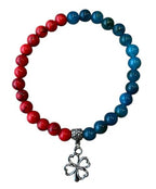Dames armband rode Howliet en Apatiet 6 mm met klaver bedel