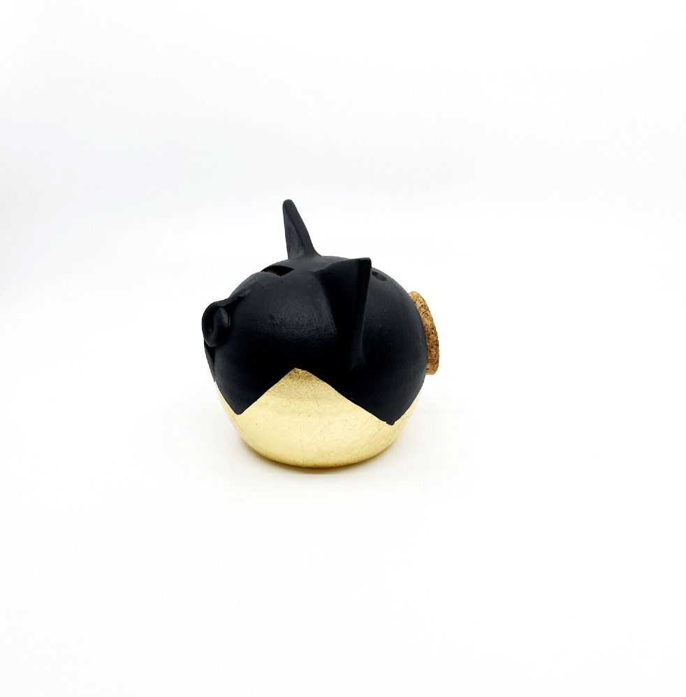 Verdeelde gouden piggy bank