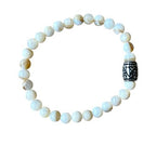 Dames armband Parelmoer 6 mm met basic kraal