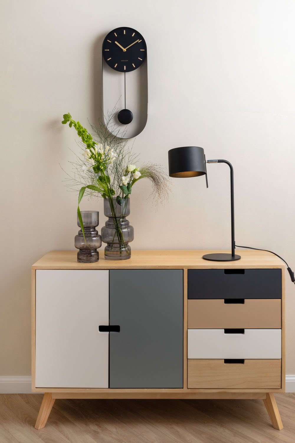 Wandklok slinger charme