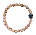 Dames armband Zonnesteen 6 mm met Boeddha kraal