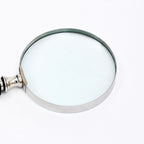 Klassiek vergrootglas met gestreept harshandvat