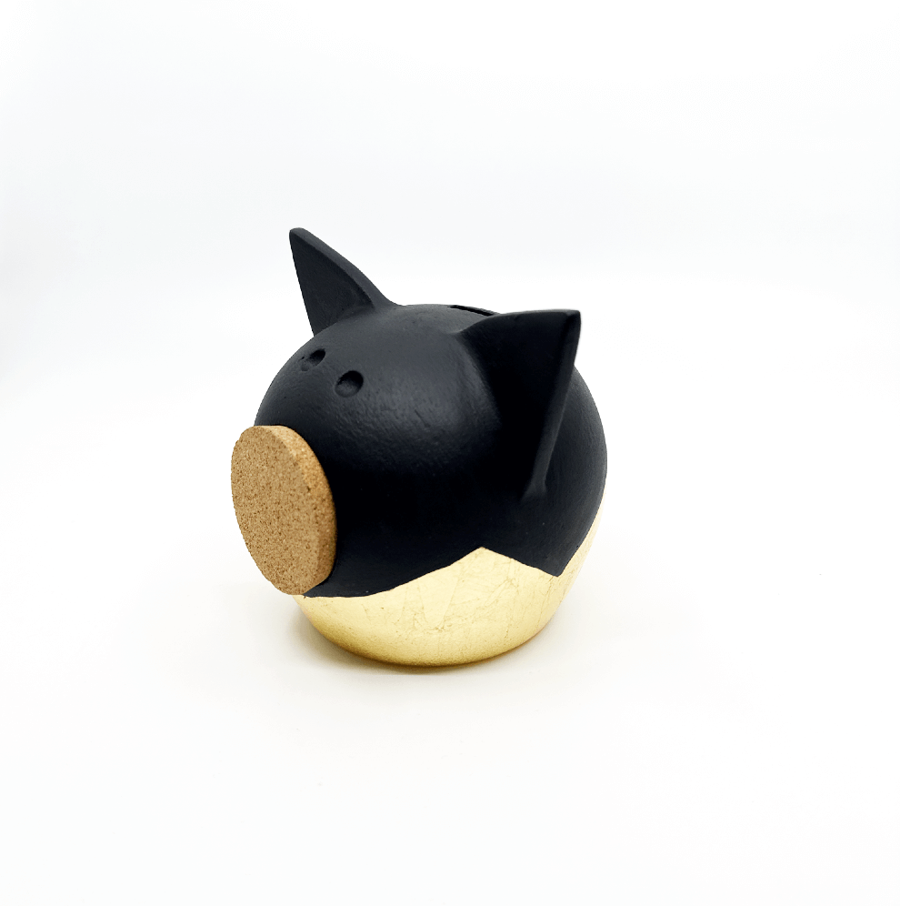 Verdeelde gouden piggy bank